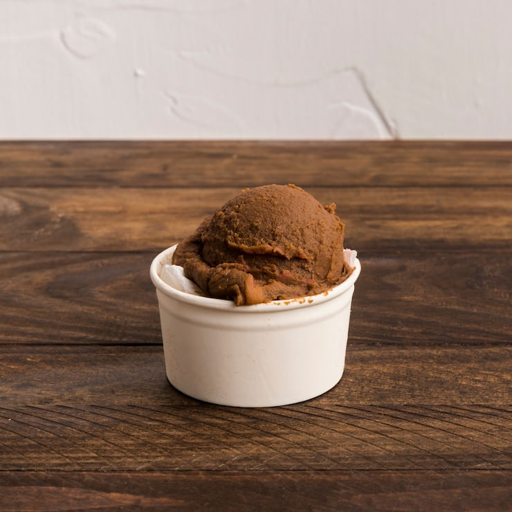 chocolate-ice-cream-white-bowl-wooden-surface_23-2148150226