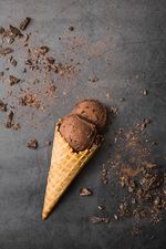 flat-lay-cone-with-ice-cream-table_23-2148422089